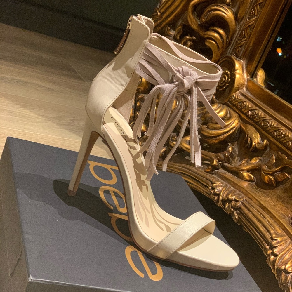 Sexy strap nude high heel sandals.